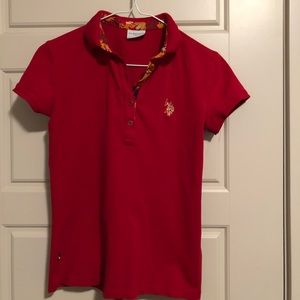 Female red polo shirt